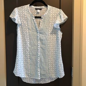 Simply styled white and mint button down blouse